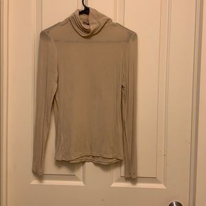 Long sleeve, nude turtle neck.